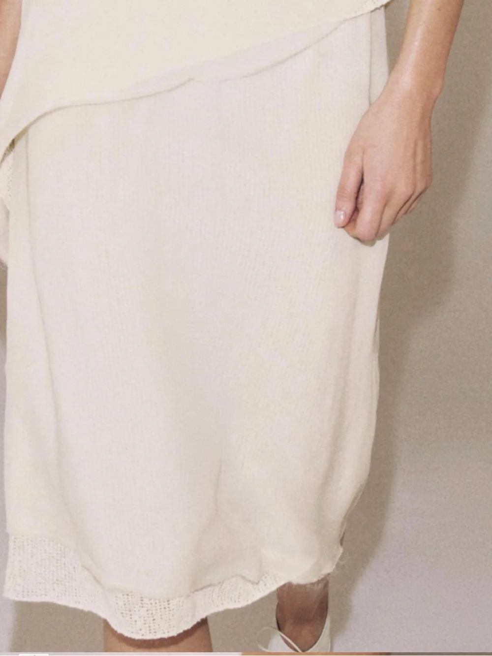 Mid-rise midi skirt with elastic waistband. Double effect detail NWT